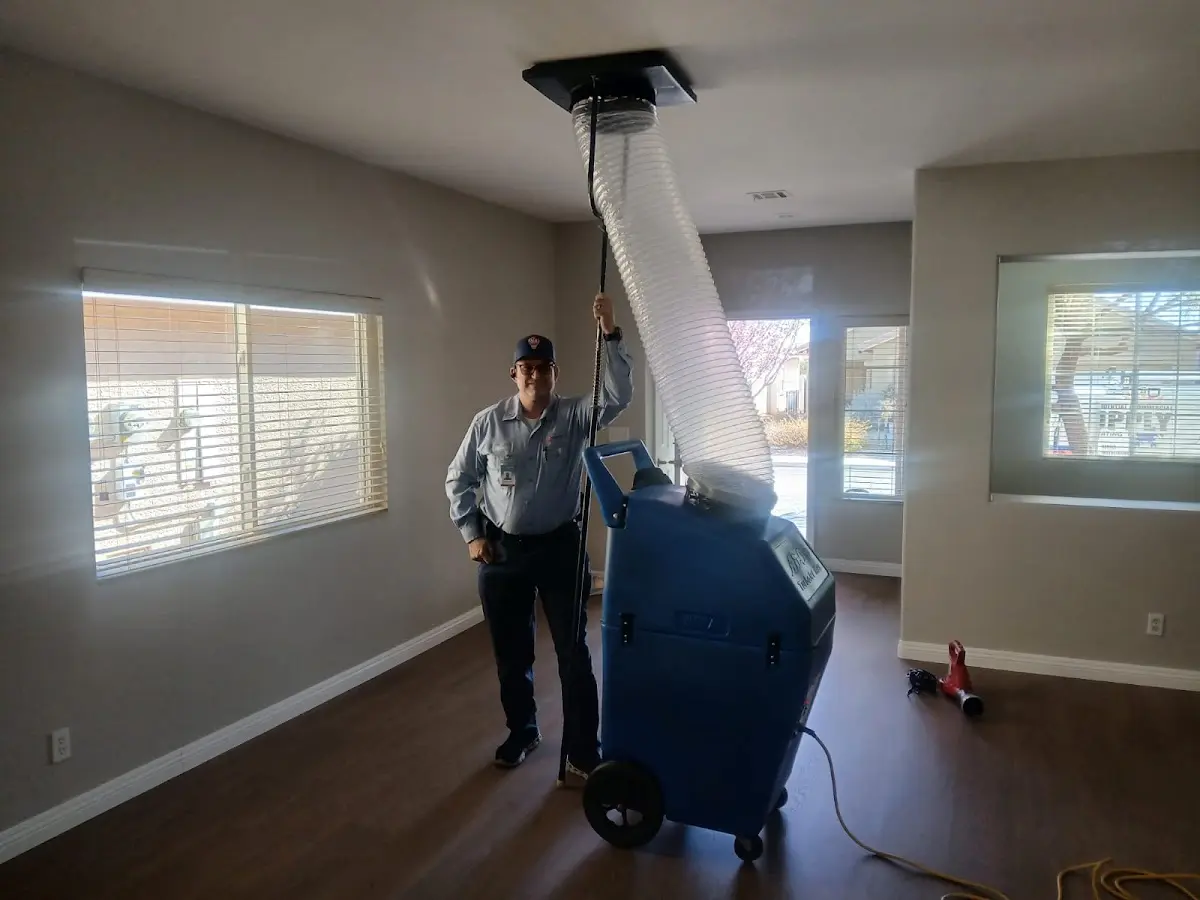 Professional Dryer Vent Cleaning work inside a Palm Springs home